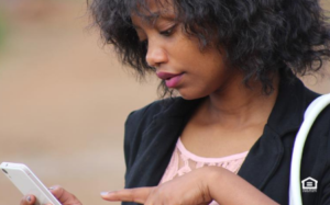Woman prescreening a tenant inquiry phone call.
