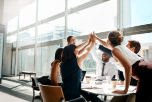 San Marcos Employees Exchanging Hive-Fives