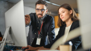 Lecturer Helps Scholar with Project, Advising on Their Work. 