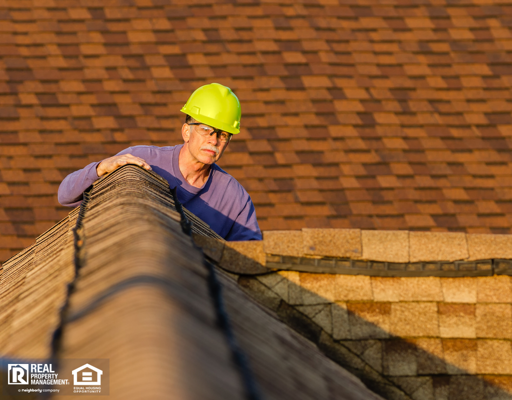 Home Inspector Looking at a Jenks Rental Property Roof