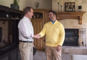 Resident and Landlord Happily Shaking Hands