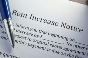 Ballpoint Pen On Top Of Rental Increase Notice