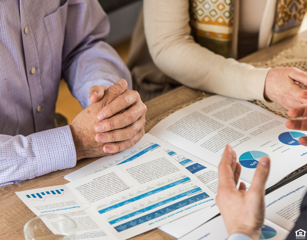 Lewisville Couple Meeting with a Financial Advisor