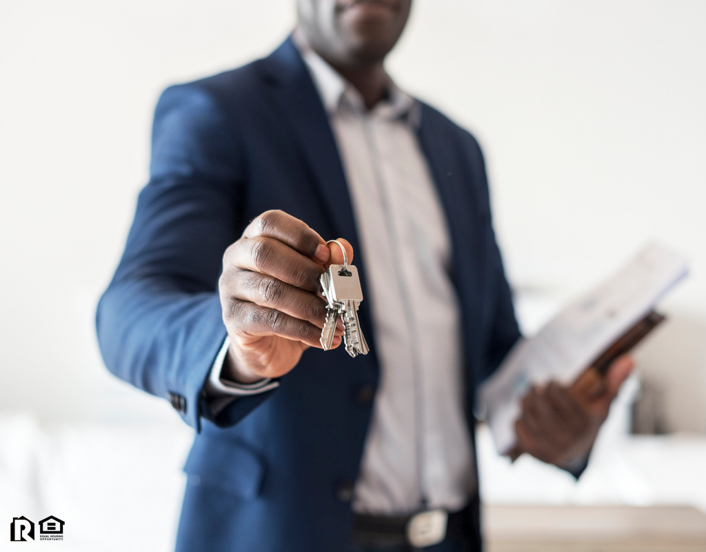 Newport News Real Estate Investor Holding Out a Set of Keys