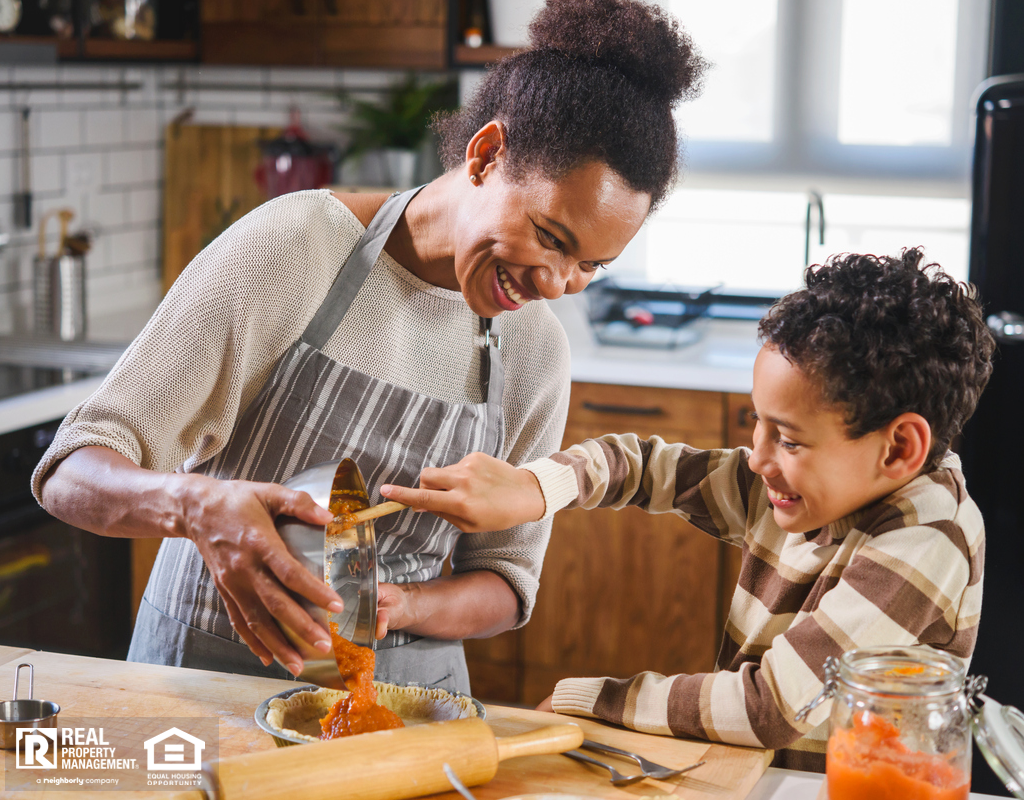 Mother and Son Taking Part in Fall Activities by Baking