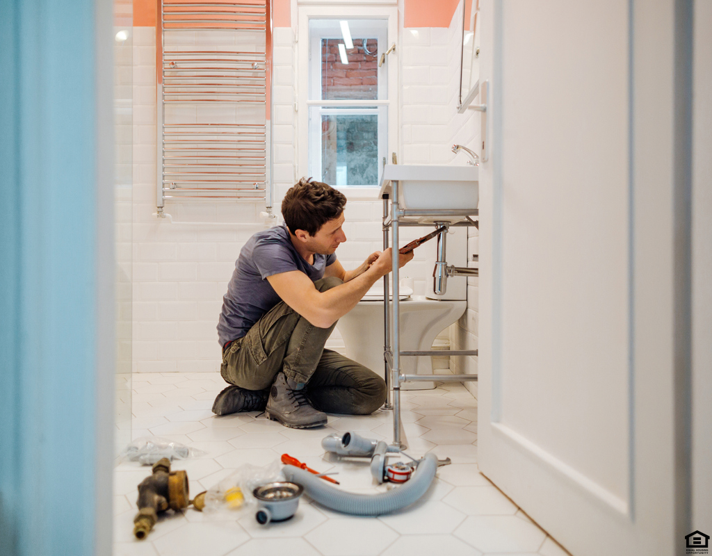 Palmdale Landlord Fixing a Sink in the Bathroom