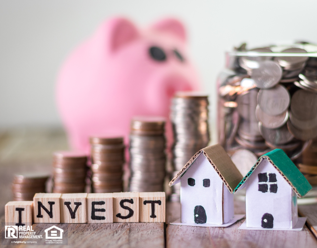 Wooden Blocks Spelling Out the Word Invest