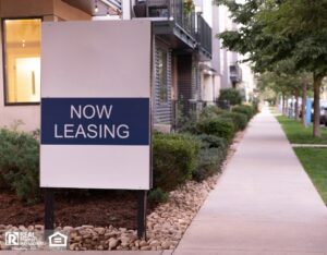 Now leasing sign outside of a rental property