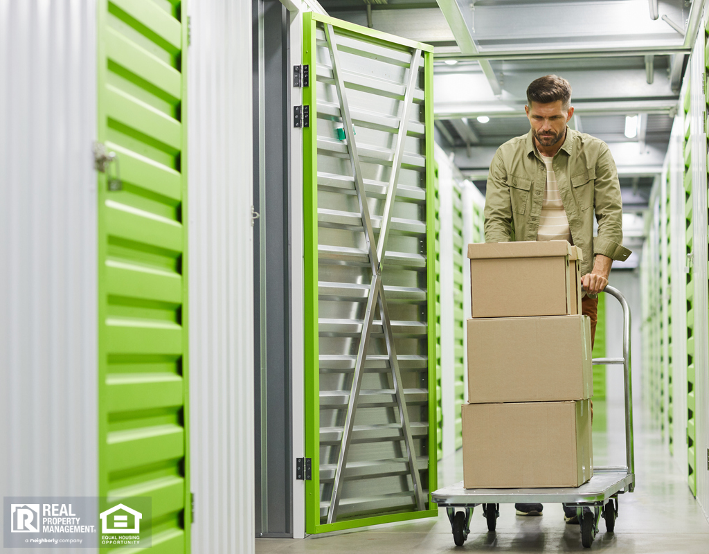 Chubbuck Man Moving Boxes into a Storage Unit