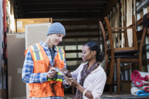 Cibolo Renter Signing a Form from a Professional Mover 