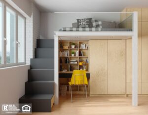 A small room with a loft bed, desk, and chair, designed to make the most of limited space.