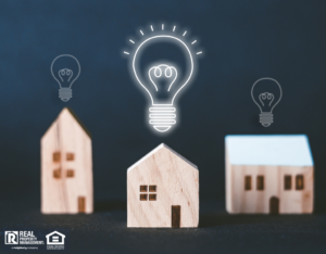 Lightbulb Illustration Above Three Tiny Wooden Houses