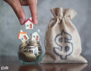 A Little Jar with Tiny Houses Next to a Bag of Money