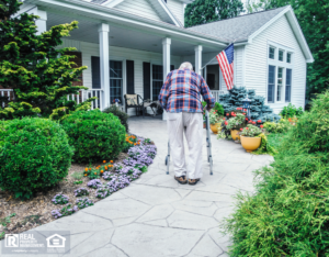 Elderly Holden Man Walking Up the Path to the Front Door