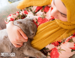 Milford Tenant Holding Her Cat