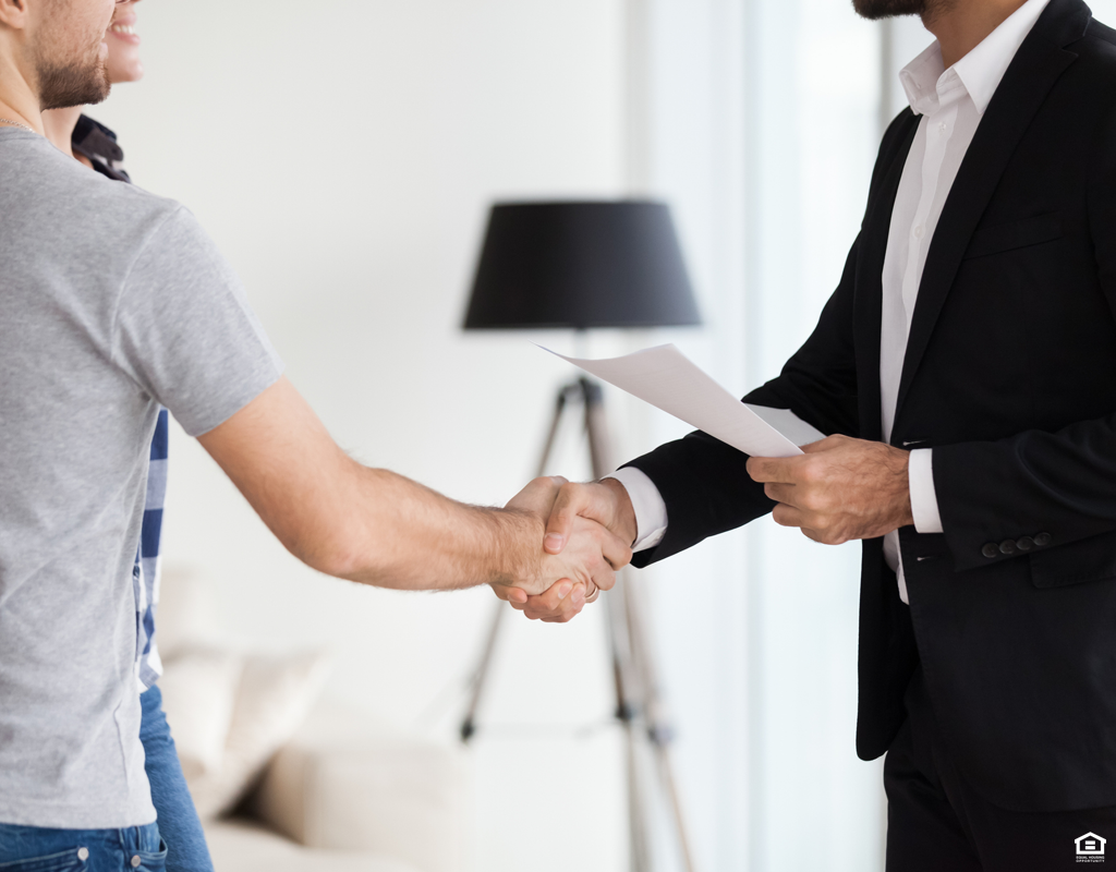 Mobile Couple Meeting With Landlord