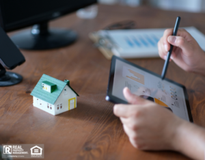 A property manager reviewing rental property reports and investment data on a tablet.