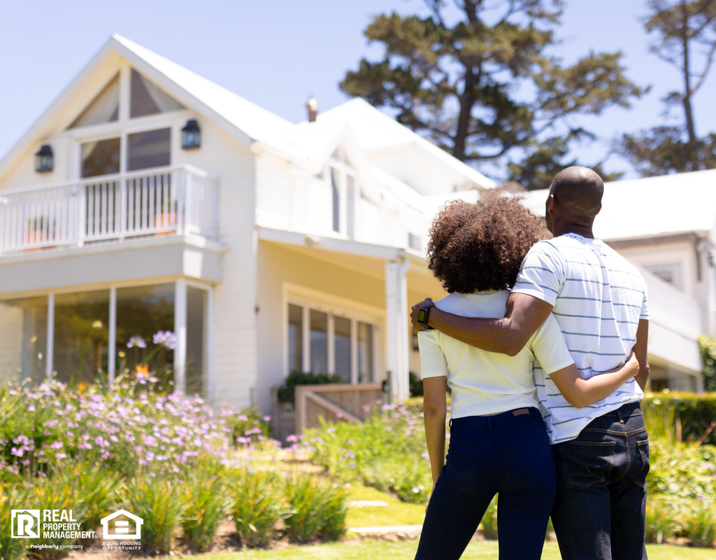 Couple Embracing and Looking at their New Evanston Rental Home