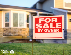 For Sale Sign in Front of Suburban Home