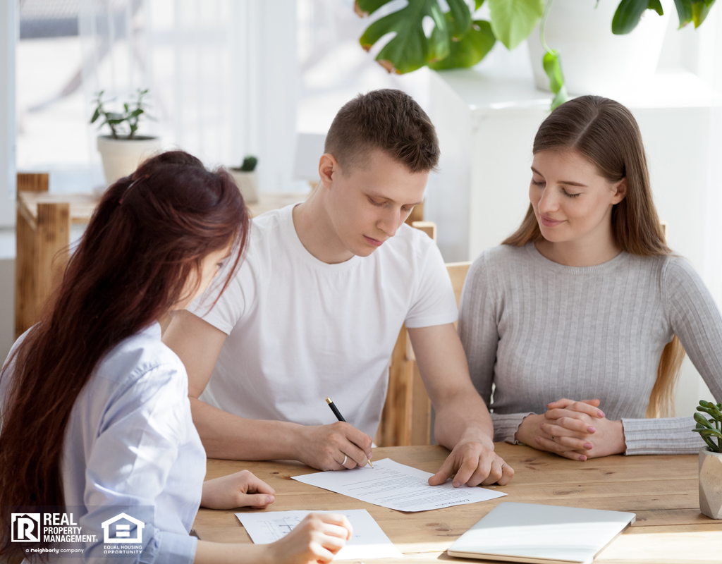 Burlingame Property Manager with Tenants Signing a Lease Renewal