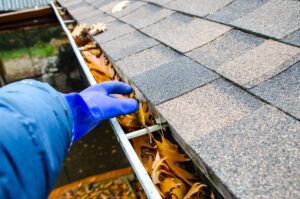 Cary Rental Property Owner Cleaning the Gutters for Spring Cleaning