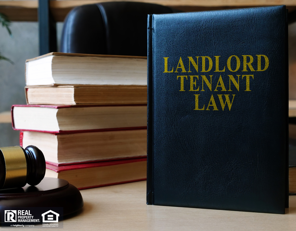 Landlord-Tenant Law Book on a Desk with a Gavel