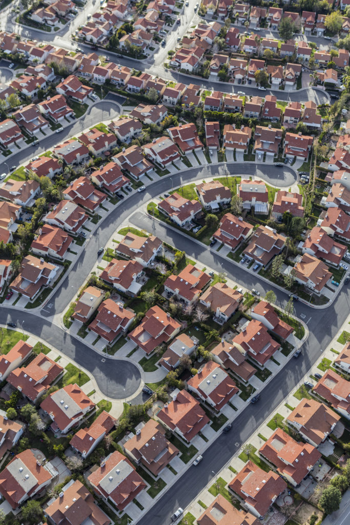 Aerial view of suburban houses, streets and cul de sacs