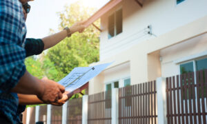 contractors examining at a house