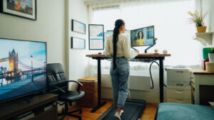 Young female resident working in her rental home. 