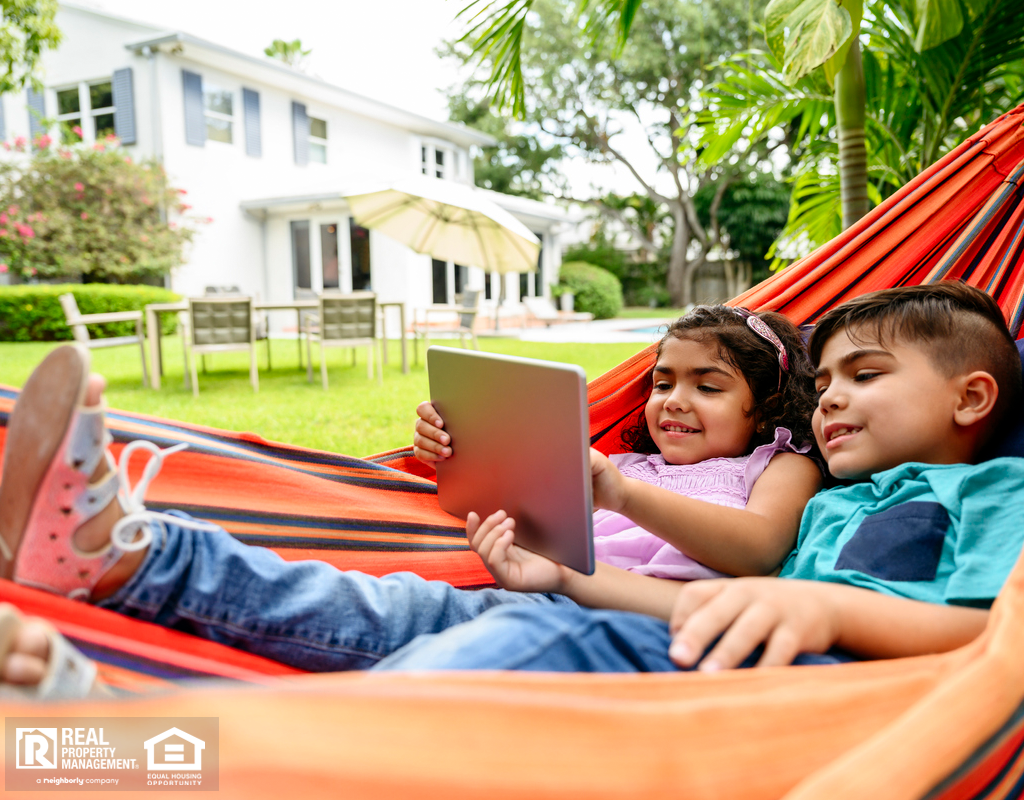 Jerome Children in a Backyard Hammock