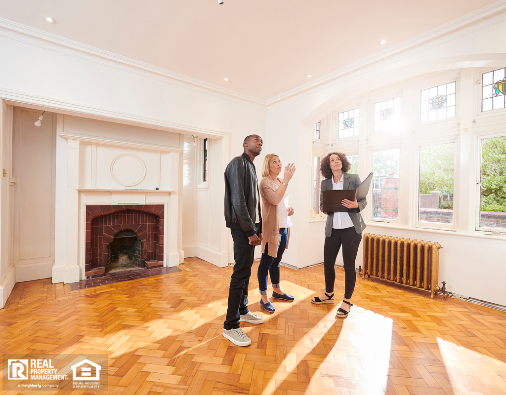 Boise Real Estate Agent Showing Property Investors a Refurbished Home