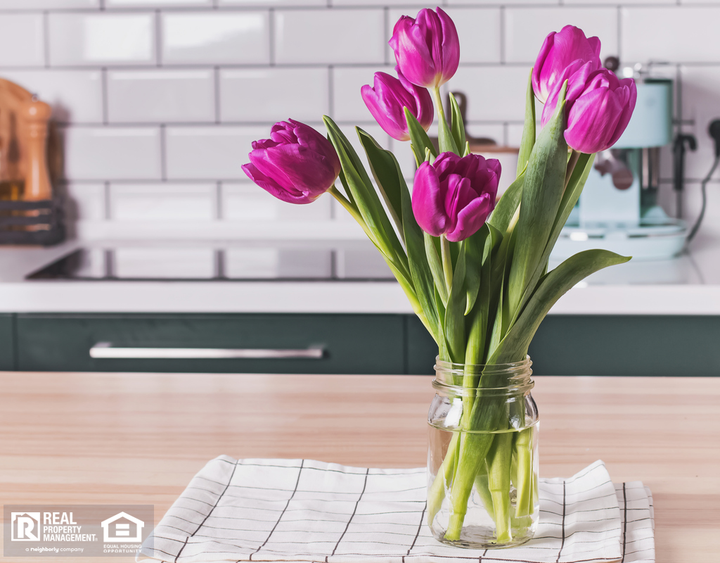 Glass Jar Vase with Flowers in a Meridian Rental Kitchen