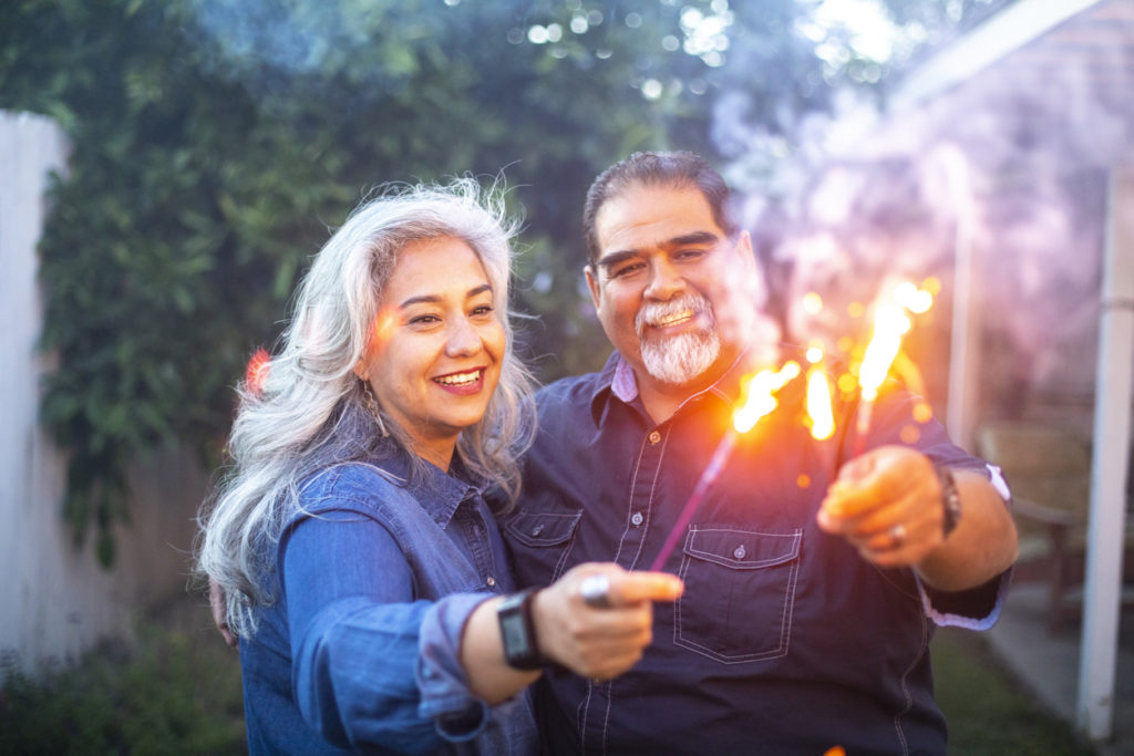 Springville Couple Holding Sparklers Together