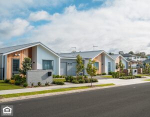 Row of single story newly developed houses.