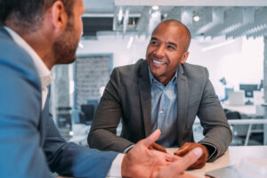 two men, colleagues, having a discussion