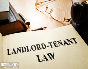 Open Landlord-Tenant Lawbook on a Desk