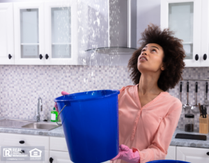 San Francisco Tenant Holding a Bucket Under a Leak