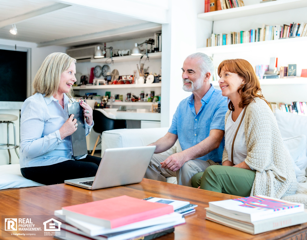 Elderly Couple Chatting with Landlord in their Beebe Rental Home