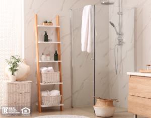 Freshly Upgraded Bathroom With Plants and a Ladder Shelf