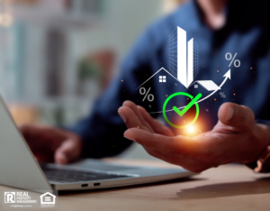 A man with a laptop displaying a green arrow and house icon, illustrating profitable real estate investment opportunities and market growth.