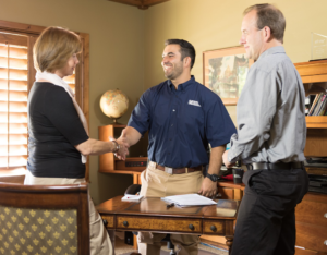 Franklin Property Manager Shaking the Hands of Satisfied Tenants