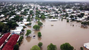 Aerial view from drone of a large flood affecting many houses