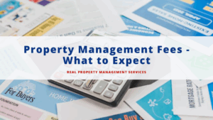 calculator over property ownership flyers and reports