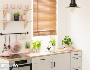 Cute Kitchenette Featuring Pink Cookware and Other Pink Accents