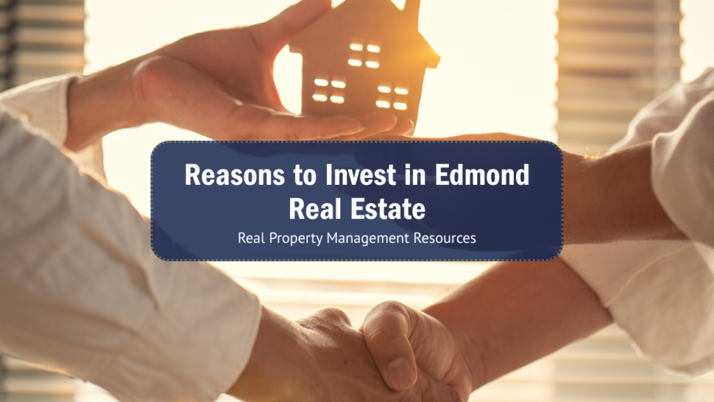 Hands hold a small house model with sunlight shining through a window. Text overlay reads "Reasons to Invest in Edmond Real Estate." Warm tone.