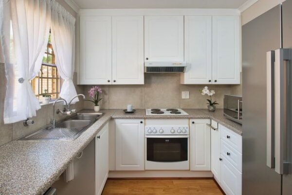 kitchen with white cupboards
