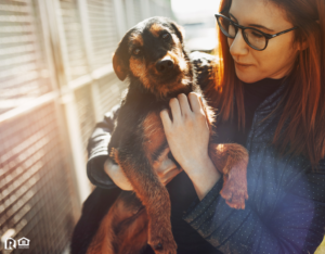 Woman Holding a Rescue Dog