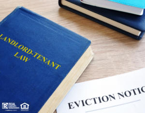 Landlord-Tenant Lawbook Next to an Eviction Notice