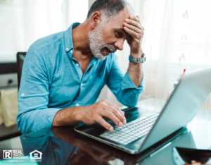 Frustrated Mature Man Working on Computer