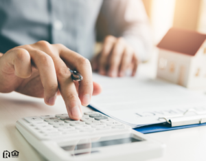 Hewitt Real Estate Investor Crunching Numbers to Determine his ROI